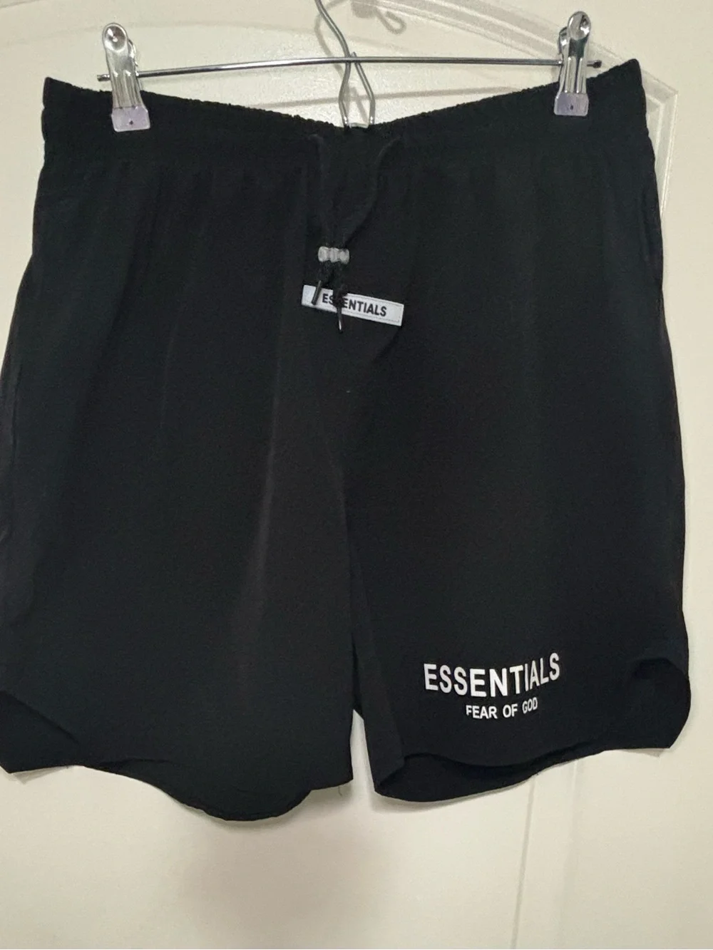 Fear of God ESSENTIALS Black Athletic Shorts with White Logo